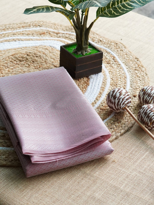 Pastel pink semi-silk saree with silver zari