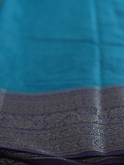 Peacock Blue Semi Jute Silk Saree with Royal Blue Border