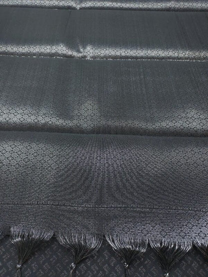 black semi-silk saree with silver zari